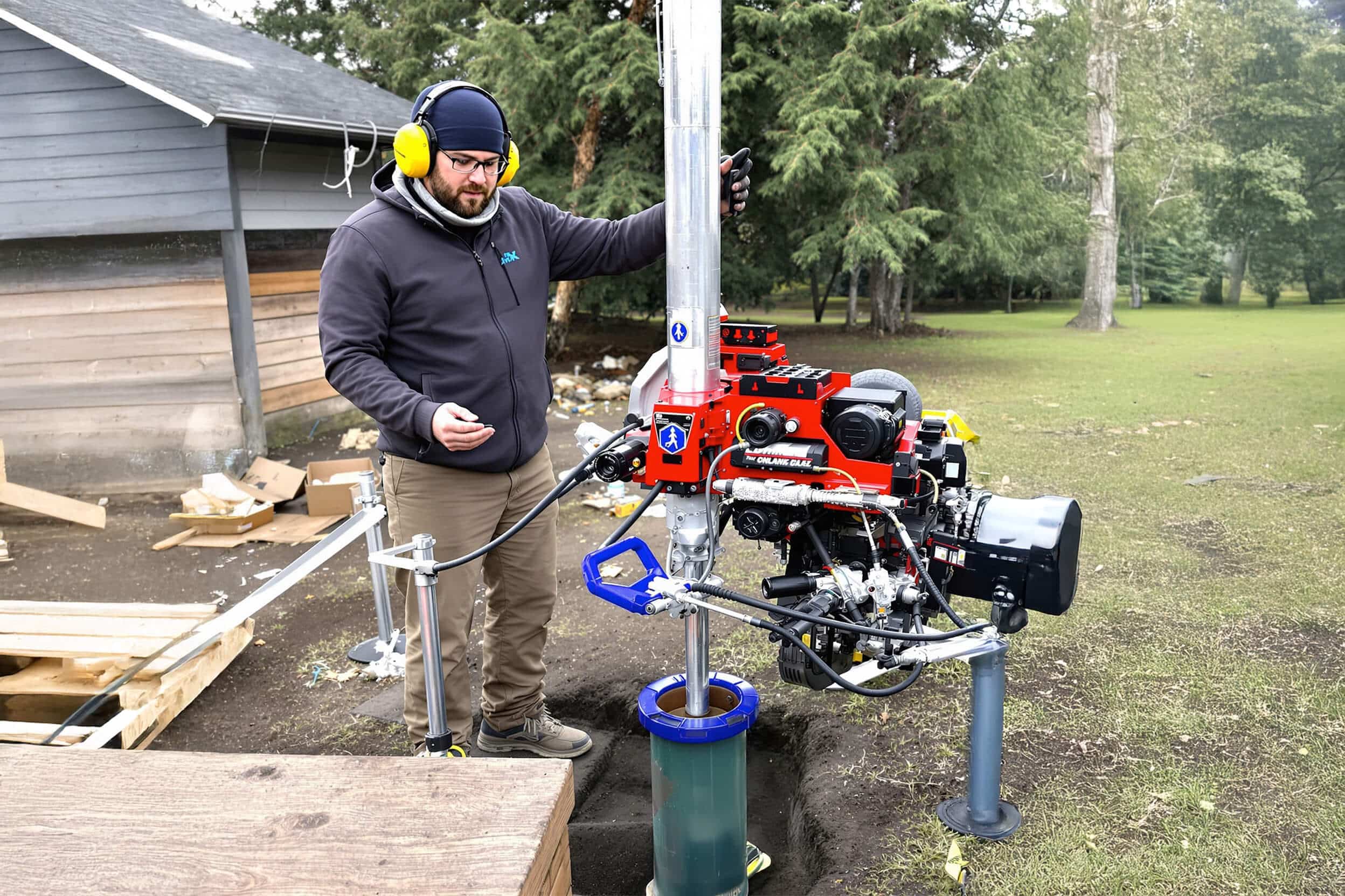 Well drilling rig at a residential property